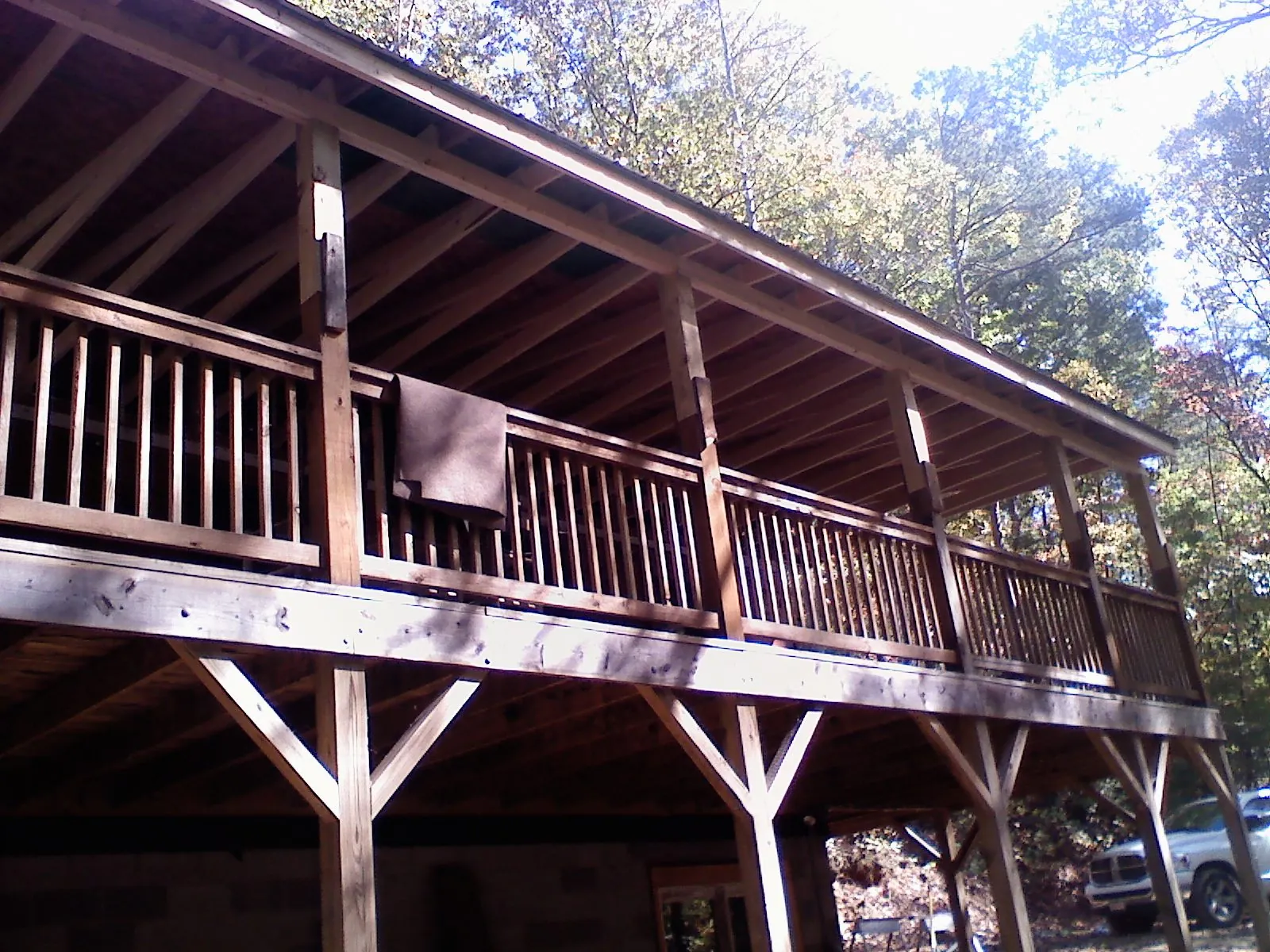 Timber framing under a new elevated porch and deck — Roof Leak Repair in El Dorado Hills by Roofing Brothers